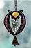 Подвеска "Охота на солнце" из витражного стекла и пера совы